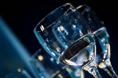 Stylish glass goblets for an evening party or holiday. Items that create a romantic atmosphere