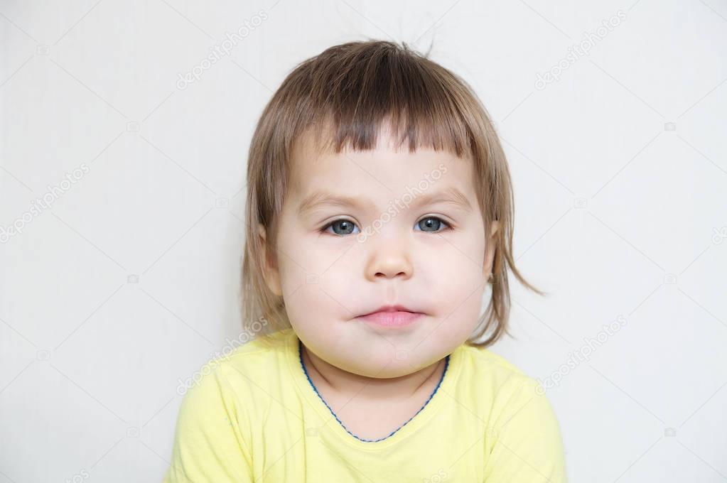 little girl portrait smiling closeup with dark blond hair