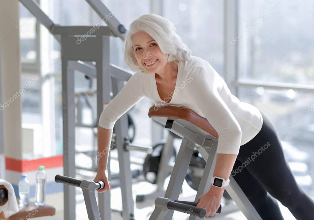 woman doing back exercise in the gym.