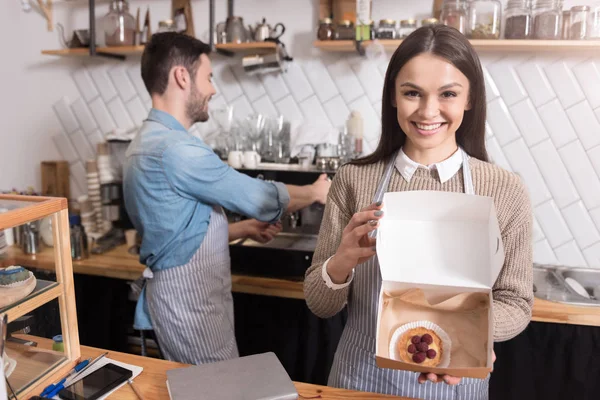 Delighted positive waiters preparing order. — Stock Photo, Image