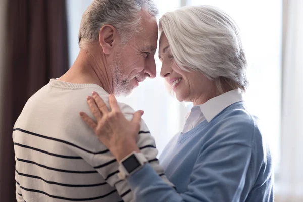 Happy aged couple dancing at home — Stock Photo, Image