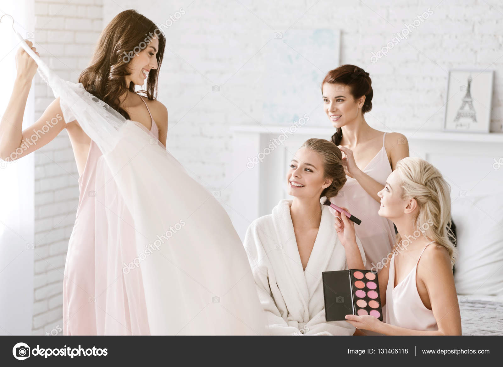 Delighted Bridesmaids Helping The Bride To Get Ready Stock Photo By C Dmyrto Z