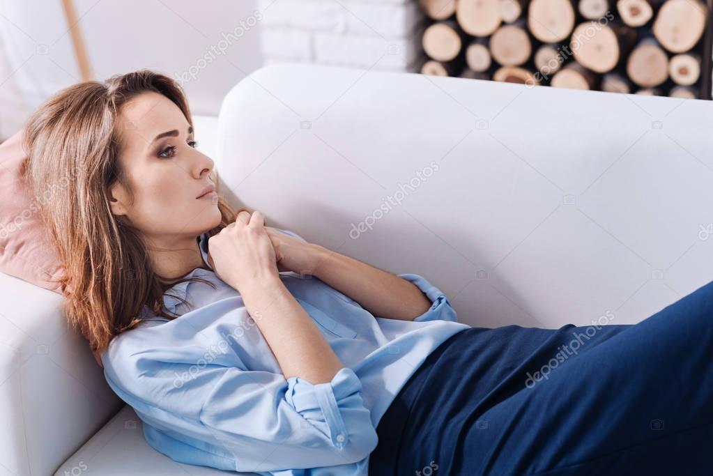 woman lying on the couch