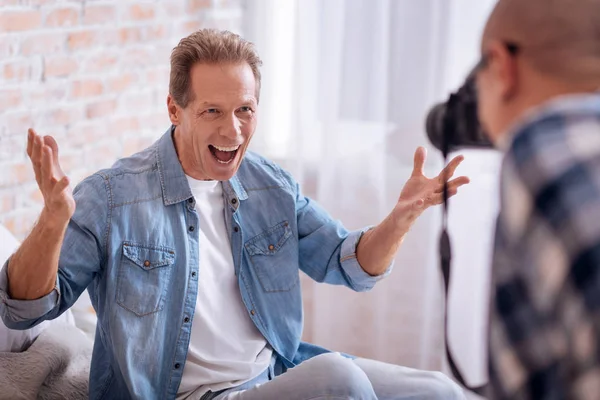Overwhelmed with positive emotions aged man posing — Stock Photo, Image