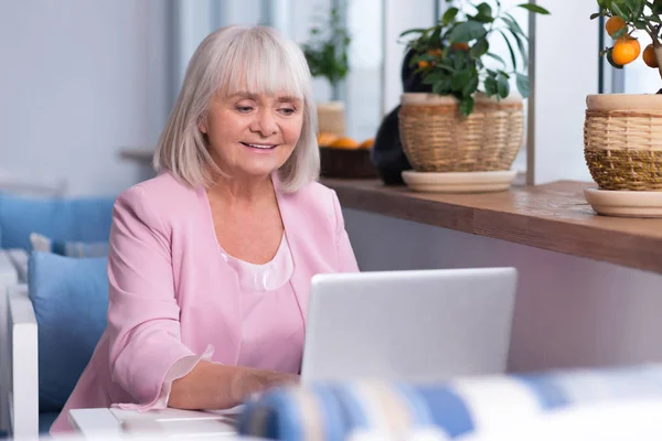 Delighted senior woman working — Stock Photo, Image