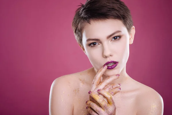 Atractive professioanl model posig on pink background — Stock Photo, Image
