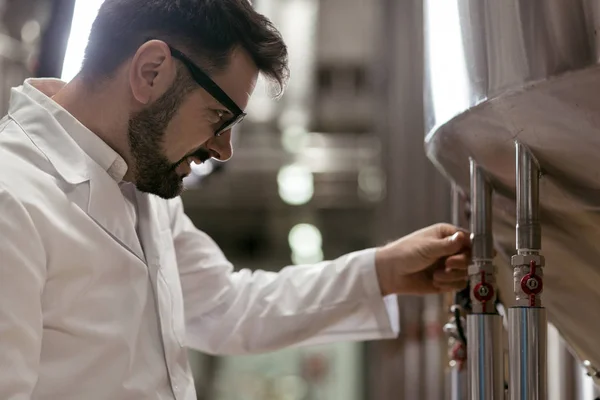 Handsome man working as a brewer — Stock Photo, Image