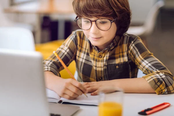 Little man-child doing hometask — Stock Photo, Image