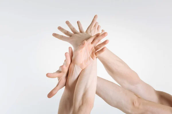 Gymnasts hands expressing grace — Stock Photo, Image