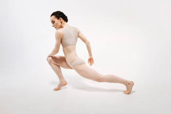 Flexile young gymnast performing — Stock Photo, Image