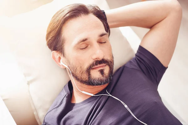 Relaxed man sleeping at home — Stock Photo, Image