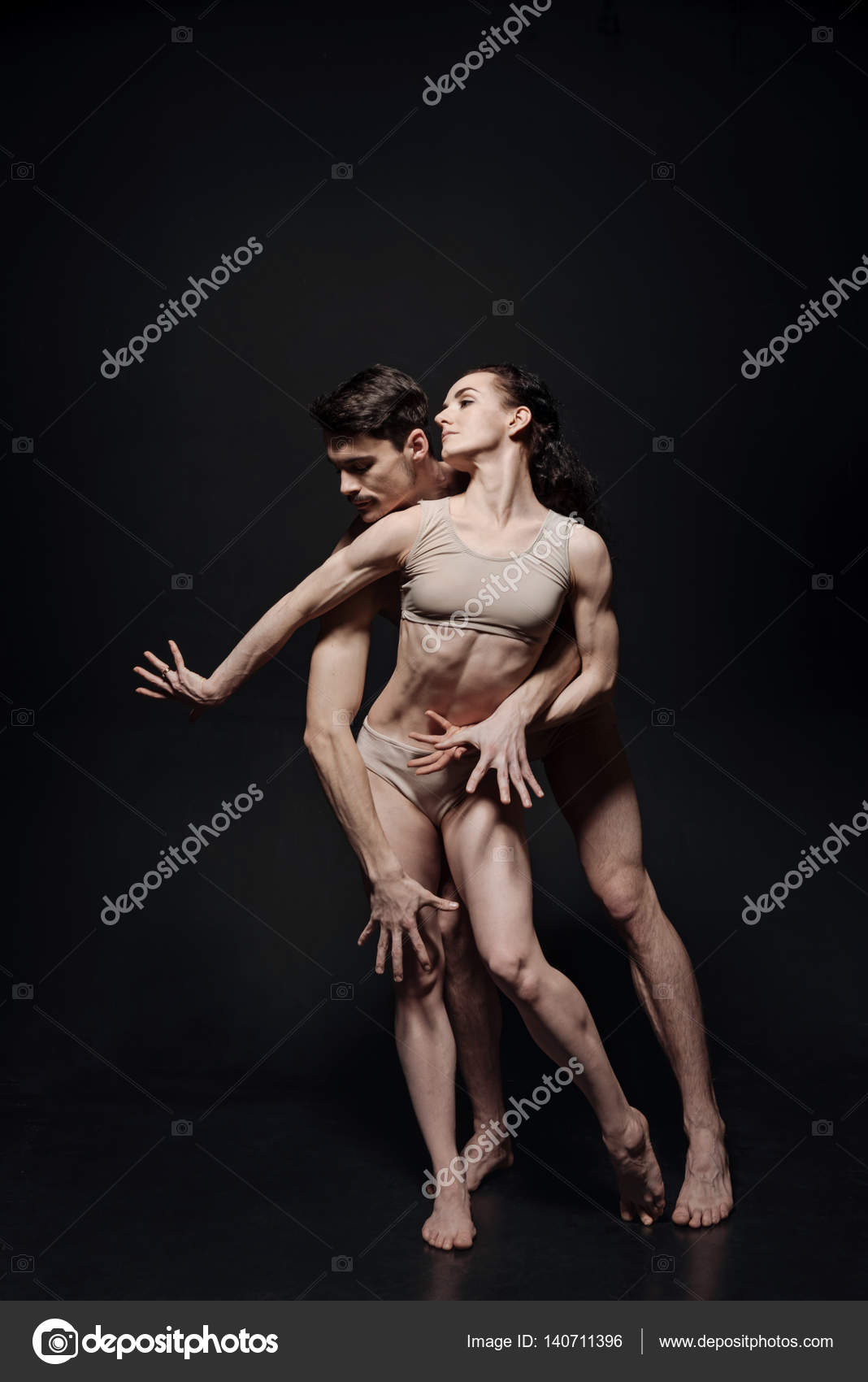 Skilled young ballet dancers performing together in the studio Stock Photo by ©Dmyrto_Z 140711396 image