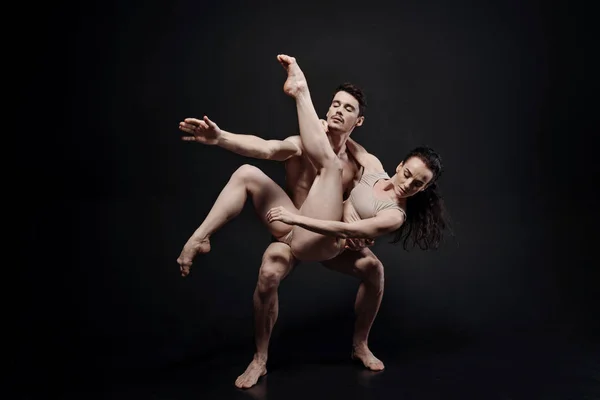 Gracile young dancers performing in the studio — Stock Photo, Image