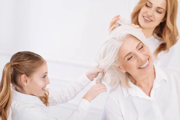 Positive family relaxing at home — Stock Photo, Image