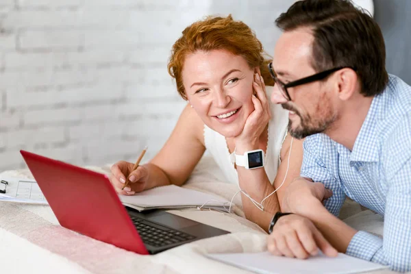 Optimistic middle aged couple expressing positivity at home — Stock Photo, Image