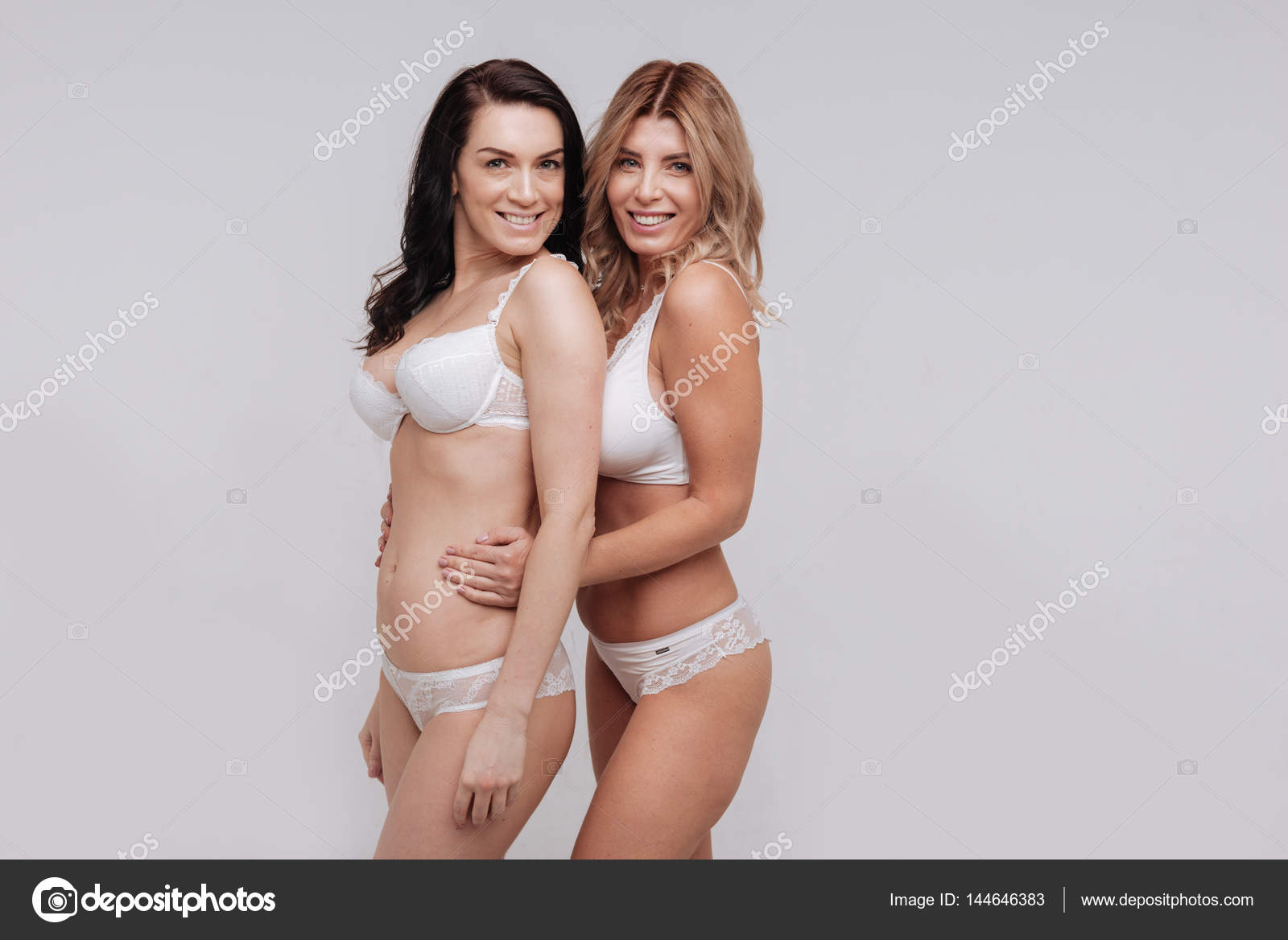 Two gorgeous women modeling in underwear Stock Photo by ©Dmyrto_Z 144646383