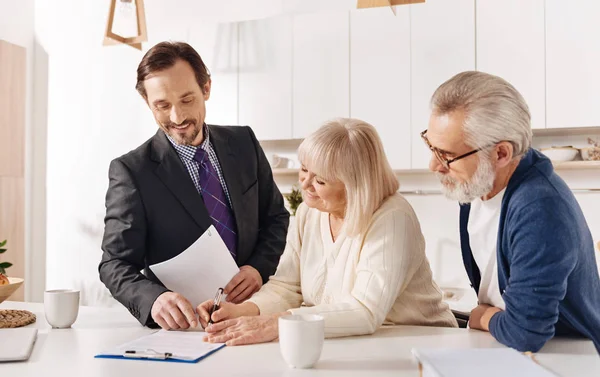 Agent meeting with elderly couple of clients — Stock Photo, Image