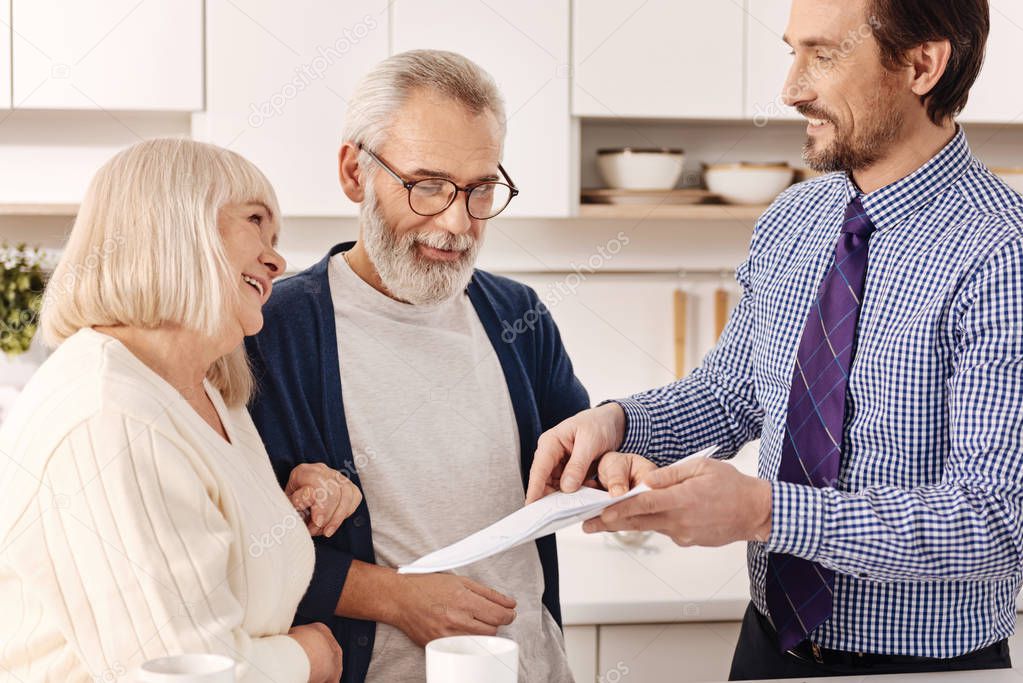 couple owners meeting real estate agent 