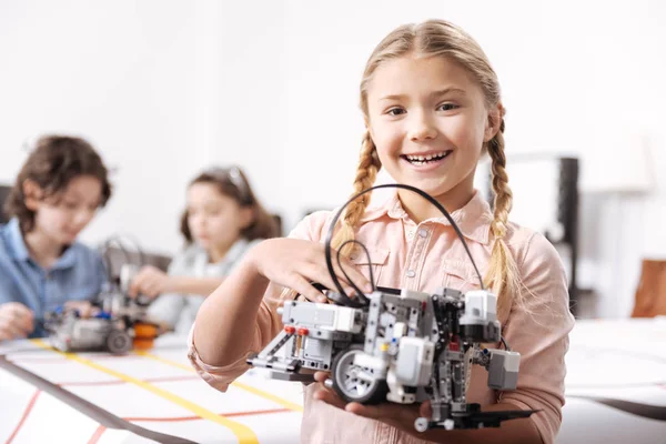 Humorous little girl representing project — Stock Photo, Image