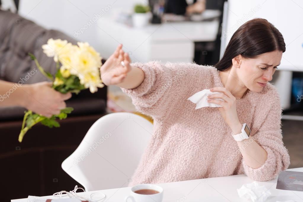 Scared girl being afraid of plants