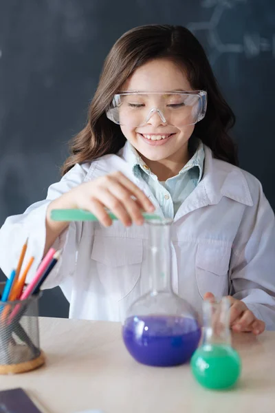 Happy pupil taking part in the chemistry — Stock Photo, Image