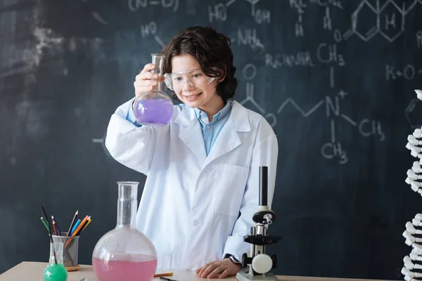 scientist enjoying chemistry experiment