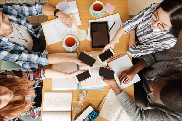Top view of students resting together