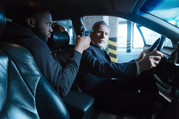 Unhappy stressed man sitting behind the wheel — Stock Photo, Image