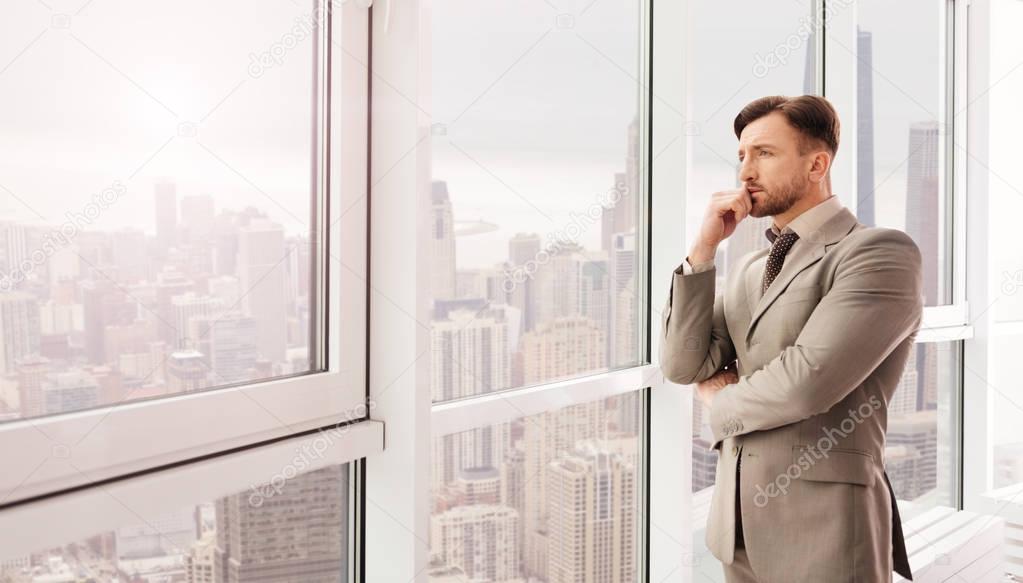 Businessman looking at city