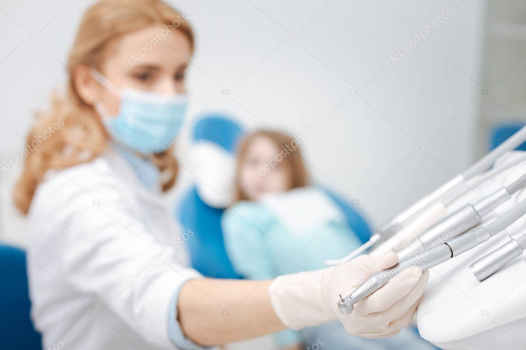 Committed skillful dentist needing special equipment