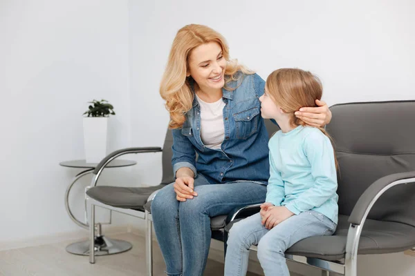 Observant great mom calming her daughter — Stock Photo, Image