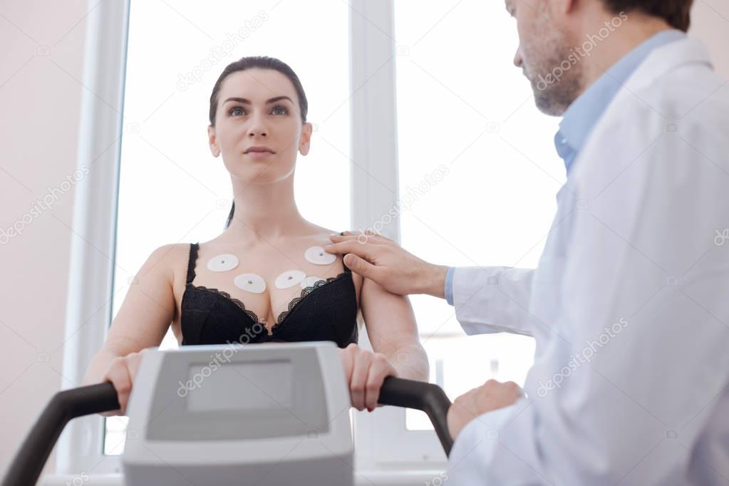 Young gorgeous lady having her cardiovascular system checked