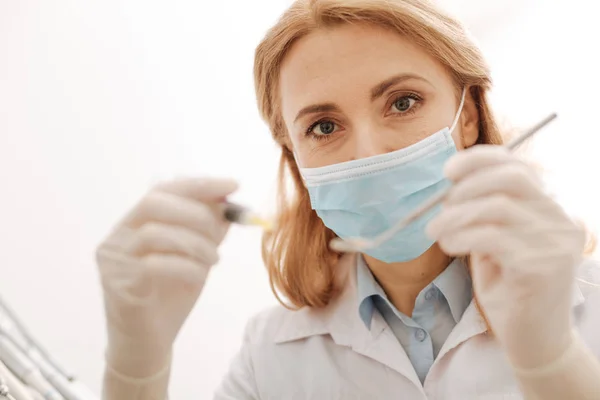 Caring patient dentist giving an injection — Stock Photo, Image