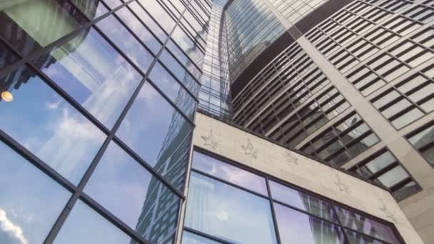 Low angle of tall glass skyscraper — Stock Video