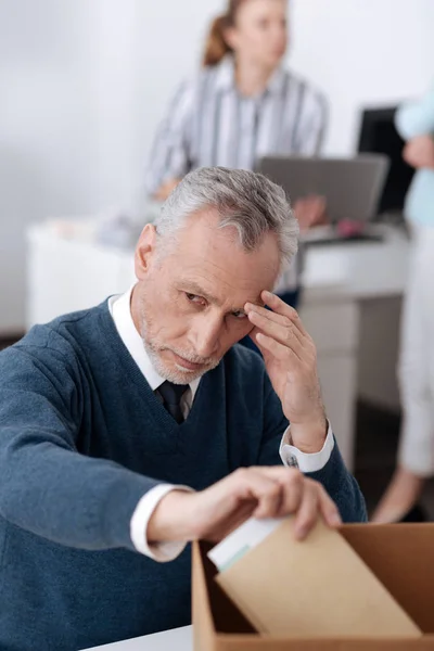Man in years looking very sad — Stock Photo, Image