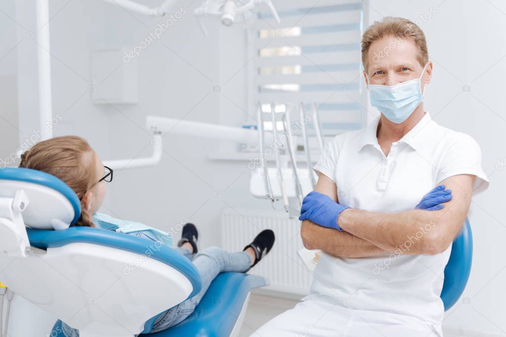 friendly dentist starting a consultation