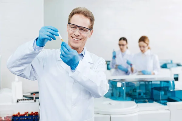 Handsome smiling male scientist looking forward — Stock Photo, Image