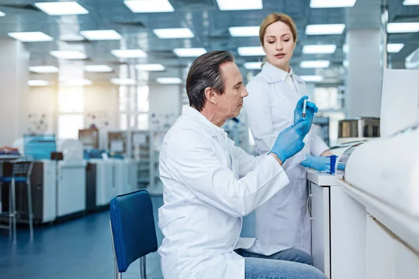 Very attentive technician working in the laboratory — Stock Photo, Image
