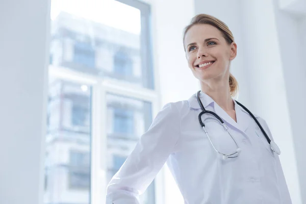 Delightful practitioner working in the clinic — Stock Photo, Image