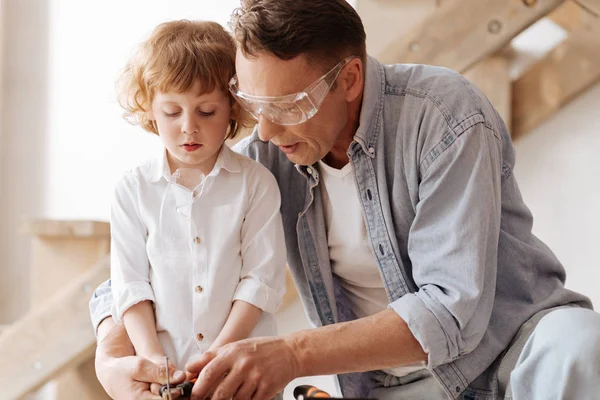 Pretty child looking attentively at the process — Stock Photo, Image