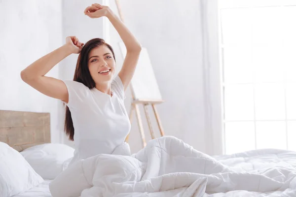 Radiant woman waking up in morning — Stock Photo, Image
