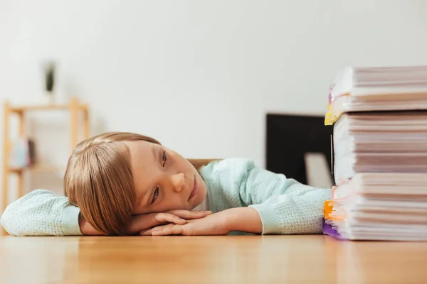 Ambitious weary child tired from the amount of work — Stock Photo, Image