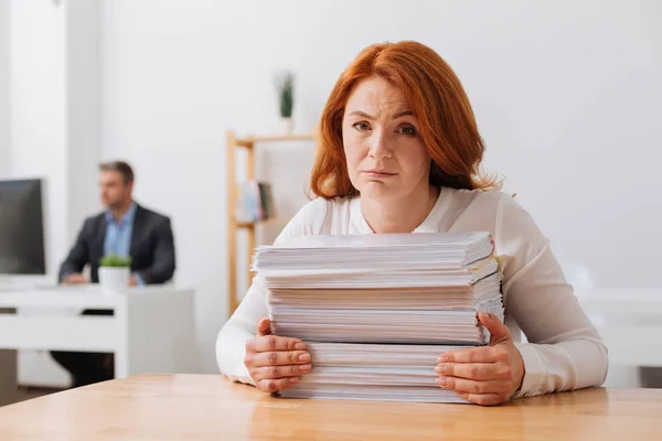 Charming sincere lady impressed with the workload — Stock Photo, Image