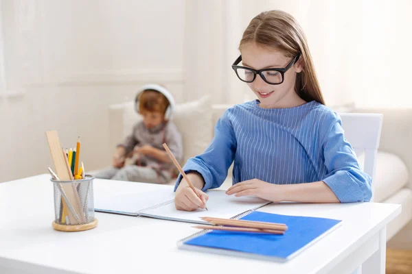 Cute motivated girl being a diligent student — Stock Photo, Image