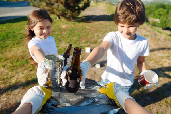 Friendly schoolmates working for goodness — Stock Photo, Image