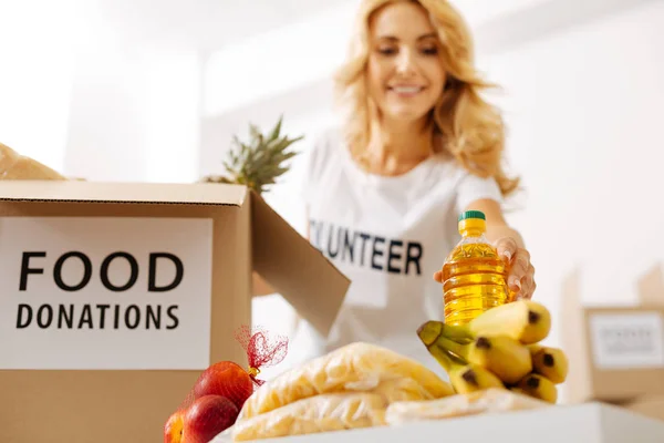 Woman collecting donations for people — Stock Photo, Image