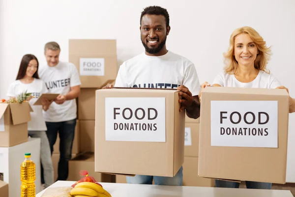 Passionate bright people encouraging contributions — Stock Photo, Image