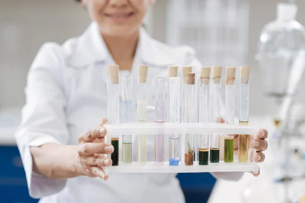 Selective focus of test tubes with different liquids — Stock Photo, Image