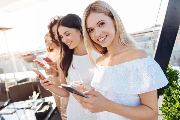 Cheerful charming woman smiling to you — Stock Photo, Image