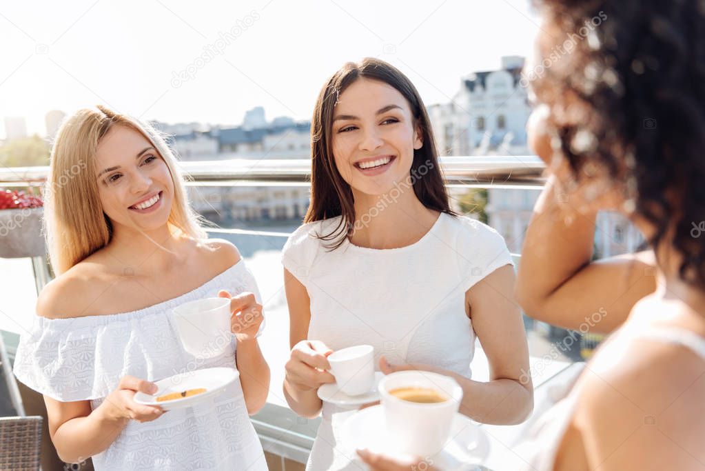 Joyful happy women laughing